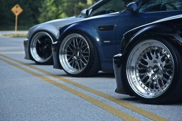 Lowered European cars on deep-dish wheels outside Eurotech Motorsports